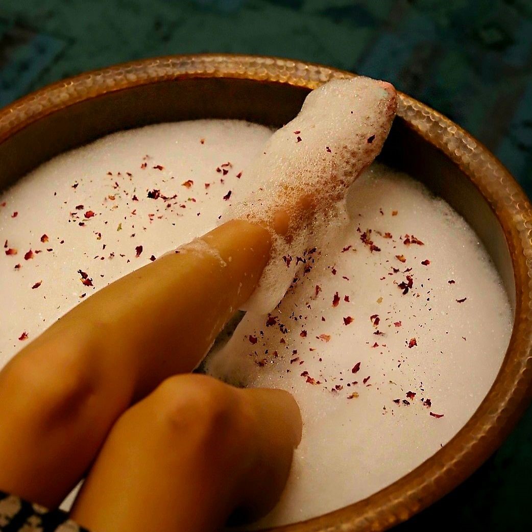 Experience our luxurious herbal foot bath ritual.